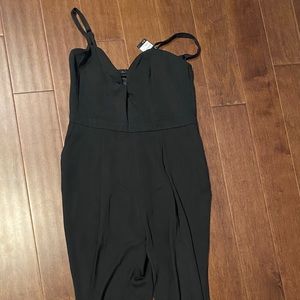 H&M black jumpsuit size 14 never worn